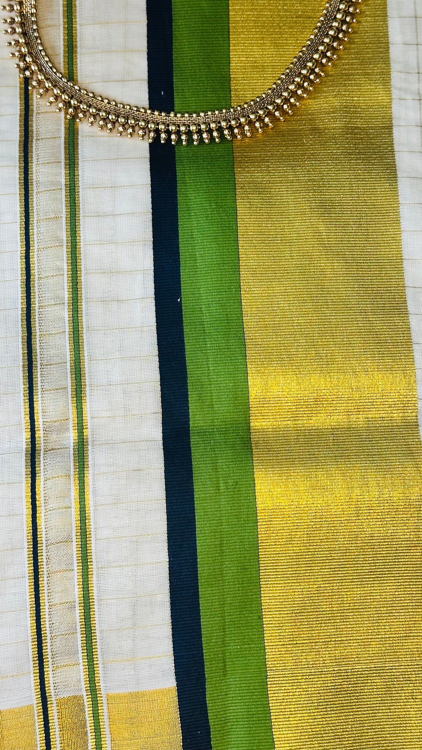 Kerala Kasavu Saree – Handloom Saree in Green and Gold Border